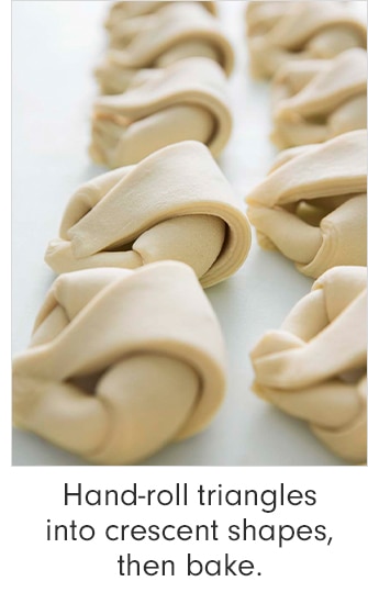 Hand-roll triangles into crescent shapes, then bake.