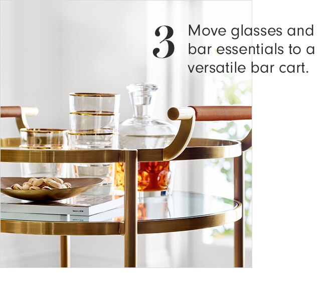 3 - Move glasses and bar essentials to a versatile bar cart.