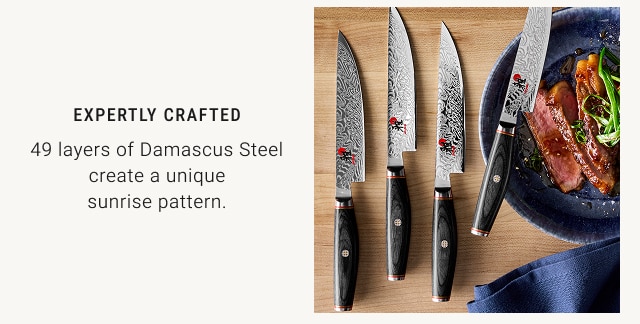 EXPERTLY CRAFTED - 49 layers of Damascus Steel create a unique sunrise pattern.